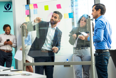 Dynamic team brainstorming with whiteboard and sticky notes in creative session
